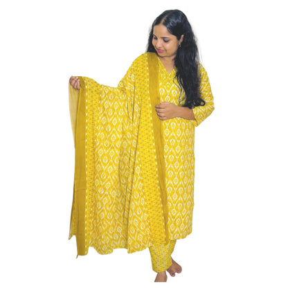 Woman modeling mehndi yellow cotton churidar set with dupatta