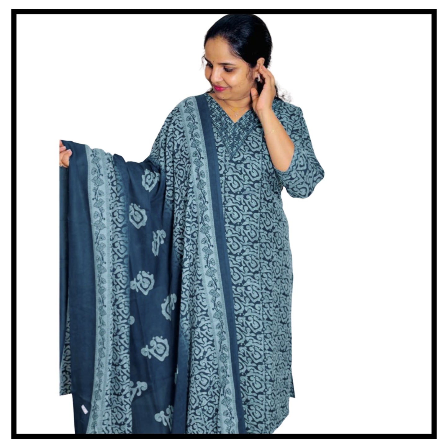 Woman wearing Kareena green Mcotton churidar kurta pant dupatta set