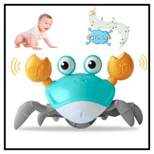 Cute teal and grey crawling crab baby toy with big eyes and orange claws, with a crawling baby graphic and musical notes saying Catch me on white background